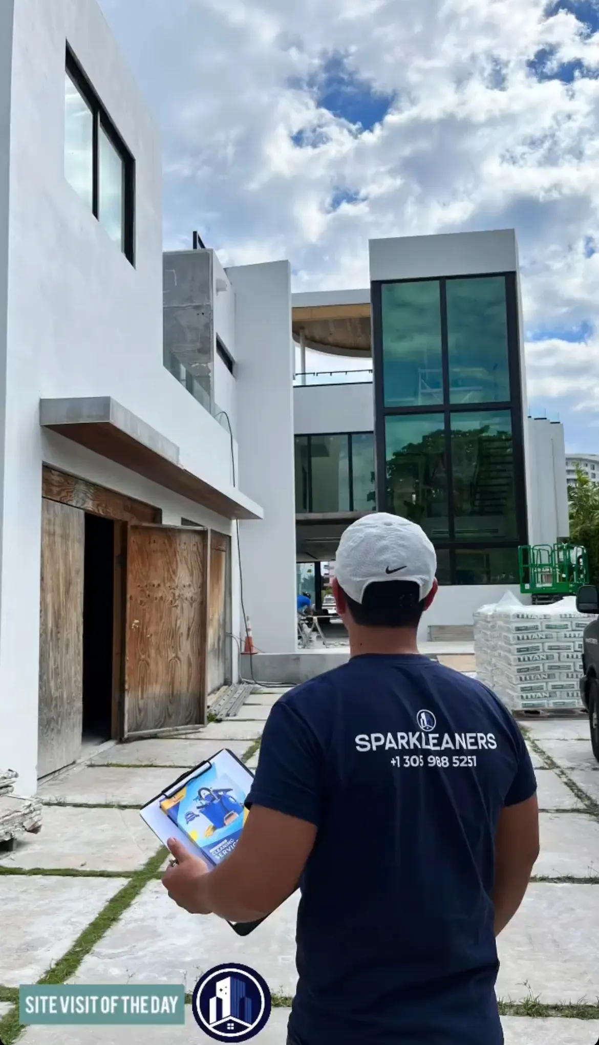 Sparkleaners team member on a site visit at a new modern home under construction in Miami